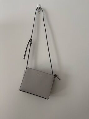 kate spade gray pebbled leather crossbody with black strap